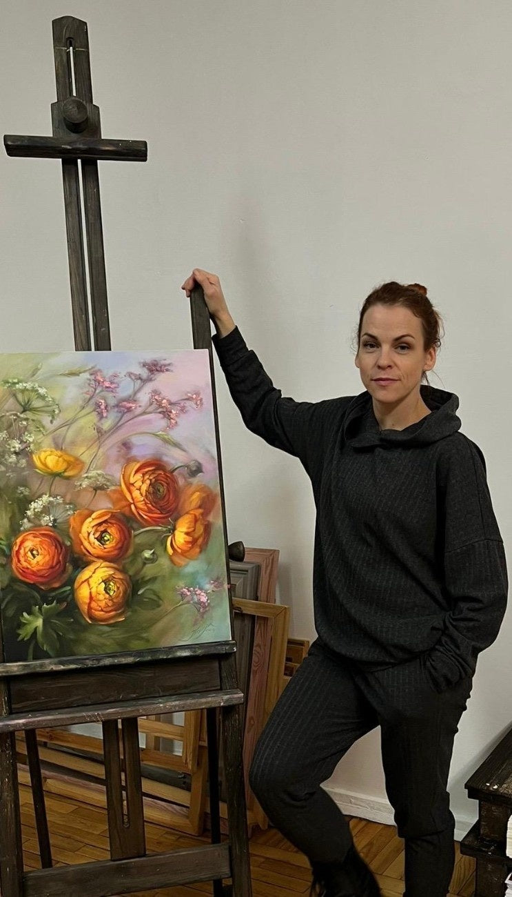 Māksliniece Ilvija Žeigure pie savas gundegu gleznas